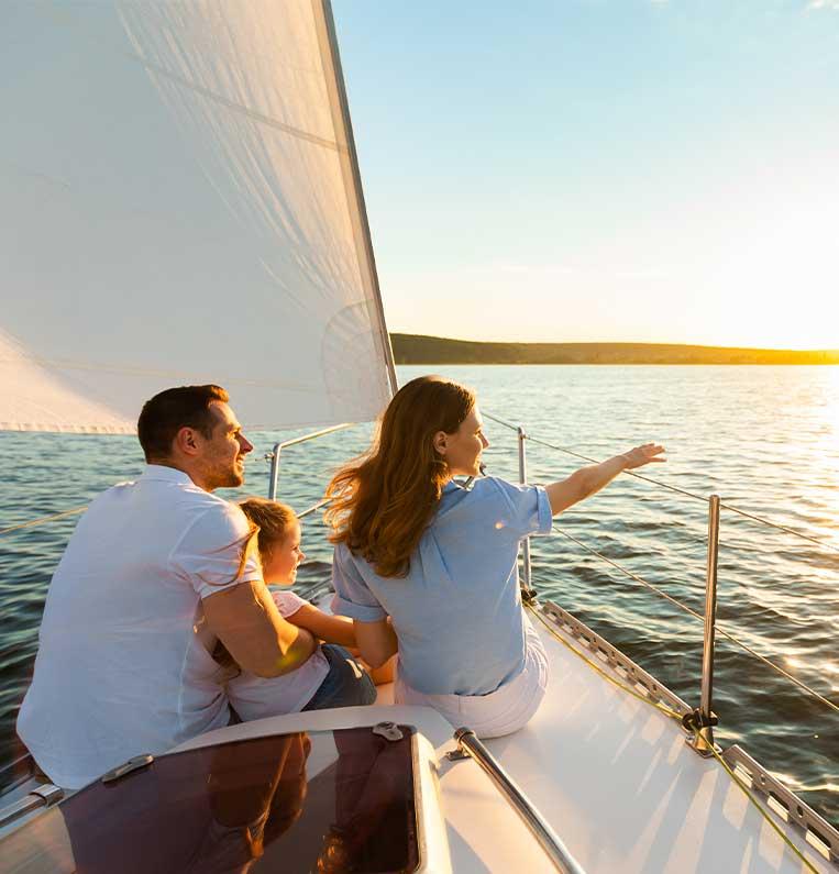 Family enjoying financial freedom on a boat